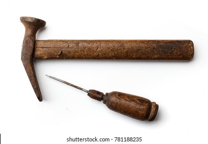 Shoemaker's tool: a hammer and awl on a white background closeup - Powered by Shutterstock