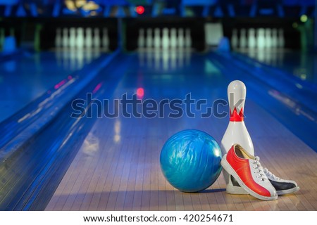 shoes, bowling pin and ball for bowling game, copy space 