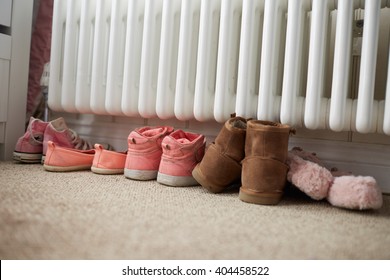 Shoes By Radiator In Family Home