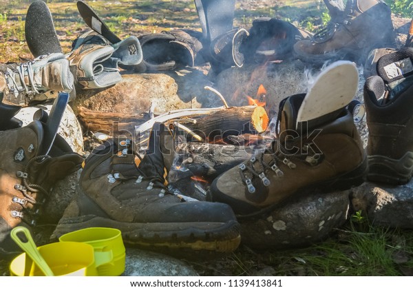 Shoes Dried Around Fire During Bivouac 
