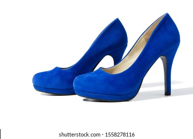 Shoes fashion woman closeup. Close-up high heels pair women shoes isolated on white background. Elegant luxury female Blue footwear on floor. Stylish suede shue. Selective focus.