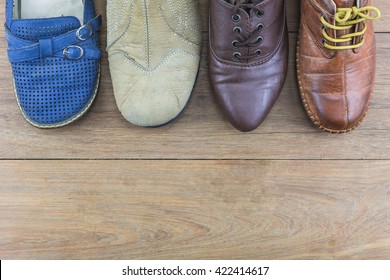 Shoes men and women active in daily life./ Shoes on the wooden floor. - Shutterstock ID 422414617