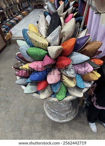 Shoes on display in traditional market shop. Marrakech, Morocco. July 26th 2024
