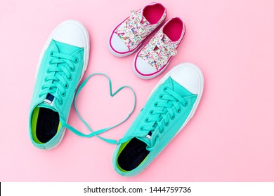 Shoes on a pink background. Flat lay