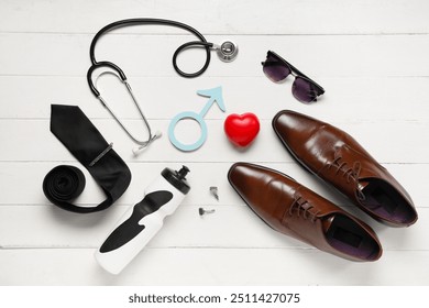 Shoes, tie, stethoscope, heart and male sign on white wooden background. Prostate cancer awareness - Powered by Shutterstock