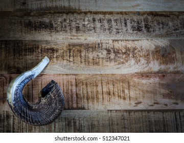 The Shofar - Ancient Musical Trumpet Made Of Ram's Horn On Wooden Background