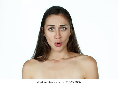 Shoked Woman Stands On White Background