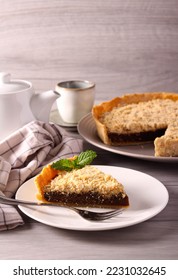 Shoofly pie - American pie made with molasses, served - Shutterstock ID 2231032645