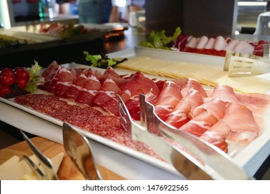   Shooting Of A Hotel Breakfast Buffet. Plates With Meet, Cheese, Salat And Bread.