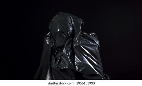 Shooting of human in black garbage bag - Shutterstock ID 1956133930