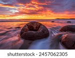 shooting Moeraki Boulders Beach in New Zealand