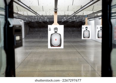 Shooting range POV, of paper silhouette target - Shutterstock ID 2267297677
