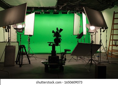 Shooting studio with professional equipment and green screen