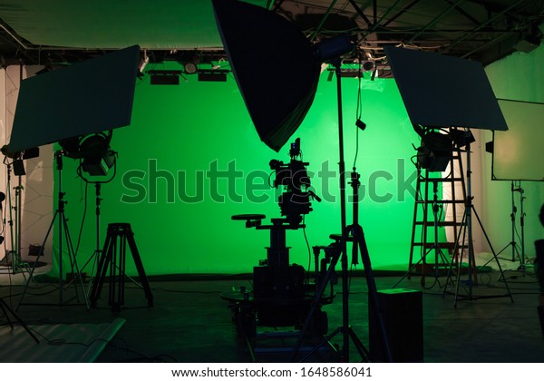 Shooting studio with professional equipment and\
green screen
