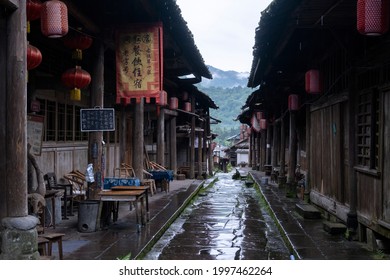 A shop in the ancient town of Wangyu, Ya 'an City, Sichuan Province, China, carries a sign with the words "dining and accommodation", "time-honored brand" and "web celebrity store".The menu is written - Shutterstock ID 1997462264