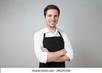 Shop Assistant With Apron (supermarket; Coffee Bar) On Grey Background