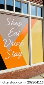 Shop Eat Drink Stay Sign On Retail And Restaurant Hotel Building Storefront In City