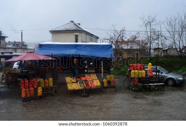 a shop of\
fruits and vegetables on the\
street