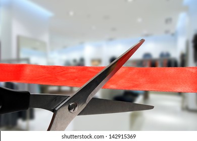 shop grand opening - cutting red ribbon