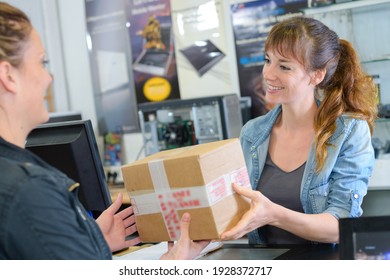 A Shop Keeper Receiving Delivery