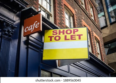 Shop to Let sign on side of vacant food retail business