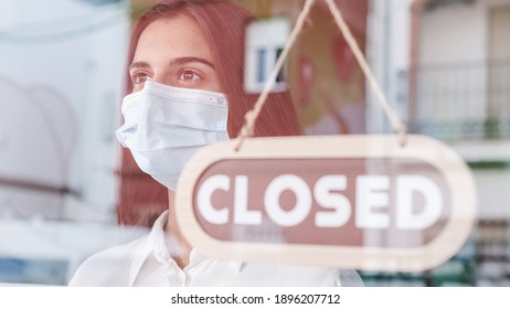Shop owner closed down due to Coronavirus - Shutterstock ID 1896207712