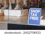shop tax free text duty free shop sign on shop window 