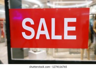 Shop Window With Sale Sign at shopping mall - Shutterstock ID 1274116765