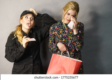 Shoplifting Is A Crime. Teenage Girl Being Caught On Stealing Clothes By Female Security Guard. Customer Thief