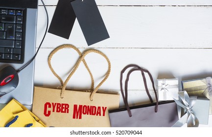 Shopper With Cyber Monday Paperbag, PC Mouse, Laptop. Ticket Label Sale Tag - Online Shopping Concept