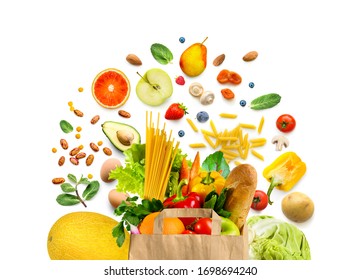 Shopping Bag Full Of Fresh Healthy Food Vegetables And Fruits. Groceries On White Background.