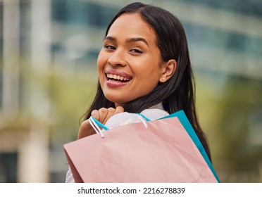 Shopping Bag, Retail And Woman In The City For A Sale In New York For A Discount Or Store At A Mall. Face Portrait Of A Happy, Young And Rich Girl With Bags After Shopping During Luxury Sales In Town