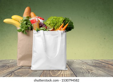 Shopping Bags Groceries On Wooden Table Stock Photo 1530794582 ...