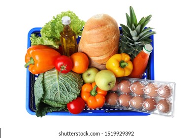 Shopping Basket With Grocery Products On White Background, Top View