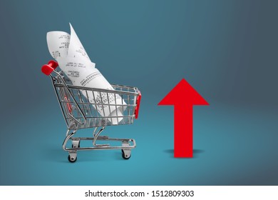 Shopping Cart With Cardboard Boxes And Red Up Arrow. Growth Wholesale And Retail. Improving Consumer Sentiment, Economic Growth. Rising Prices For Goods, Inflation. Growth Of Popularity Of The Product