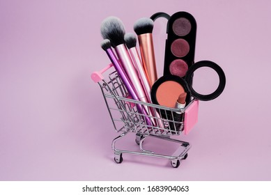 Shopping Cart With Cosmetics. Online Sales Concept
