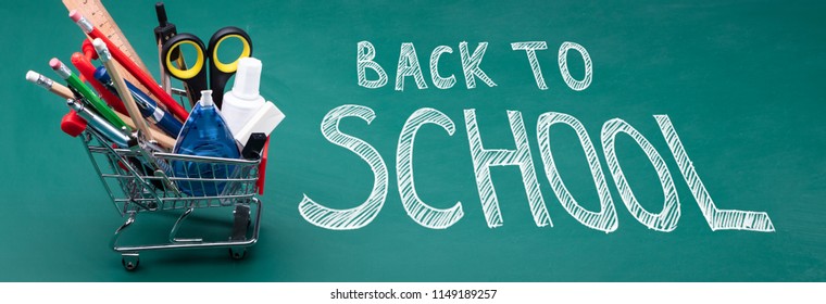 Shopping Cart Filled With School Supplies On Blackboard With Back To School Text