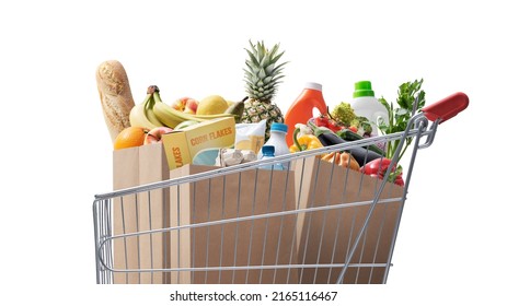 Shopping cart full of fresh groceries, grocery shopping concept Isolated on white background - Shutterstock ID 2165116467