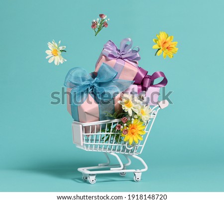 Shopping cart with gifts and flowers