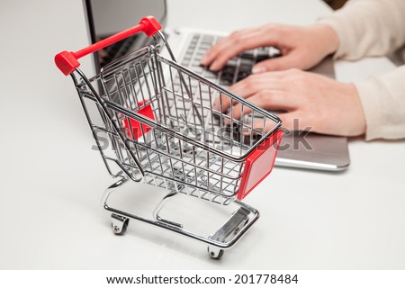 shopping cart and laptop (online shopping)