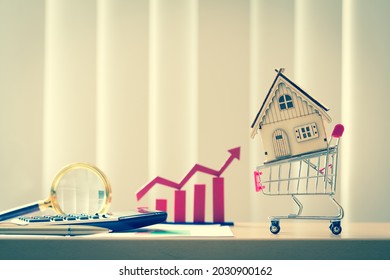 Shopping Cart And Magnifying Glass Searching For Home And Red Arrow And Bar Graph And Calculator And Agreement In The Office, Loan For Real Estate To Family In The Future Concept.