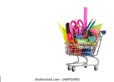 Shopping Cart With School Stationery On White Background. Back To School Education Concept.Colorful School Supplies In Shopping Cart