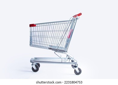 shopping cart side view trolley red colour on white background | E-commerce supermarket trolley side view - Shutterstock ID 2231804753