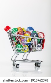 Shopping Cart With Social Media Logos From Facebook, Instagram, Youtube And Whatsapp Symbolizes The Business With Users. Vertical Format