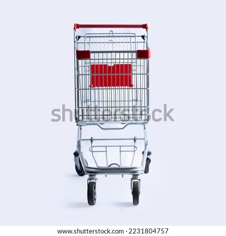 shopping cart trolley red colour on white background | E-commerce supermarket trolley front view