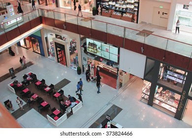 Shopping Center Dubai Mall, Top View Inside, Boutiques And People Make Purchases, United Arab Emirates April 14, 2014, Soft Focus