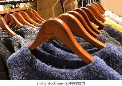 Shopping. Color Winter Warm knitted sweaters in shop. - Powered by Shutterstock