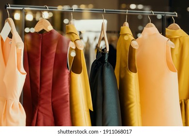 shopping concept - colorful clothing in a fancy store - Shutterstock ID 1911068017