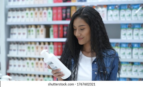 Shopping Concepts. Asian Women Are Buying Shampoos In Beauty Salons.