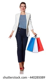 Shopping. The French Way. Full Length Portrait Of Happy Young Woman With French Flag Colours Shopping Bags On White Background Going Forward